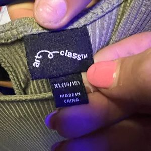 Like new, I believe it was worn 3 times. No tears or stains